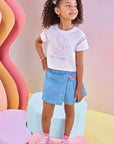 Conjunto de Blusa Boxy em Meia Malha e Short Saia em Jeans com Elastano 83449 Infanti Infantil Menina