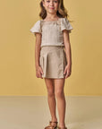 Conjunto de Blusa Cropped em Tecido Plissado e Short Saia em Tricoline com Elastano 88154 Infanti Infantil Menina